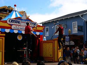 torch-juggling-on-high-unicycles_4911296543_o.jpg
