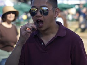 jon-eatting-chocolate-covered-bacon-1_4904563036_o.jpg